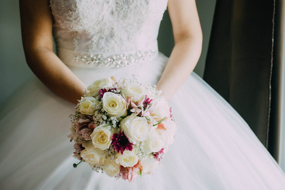 Bride holding a beautiful floral bouquet